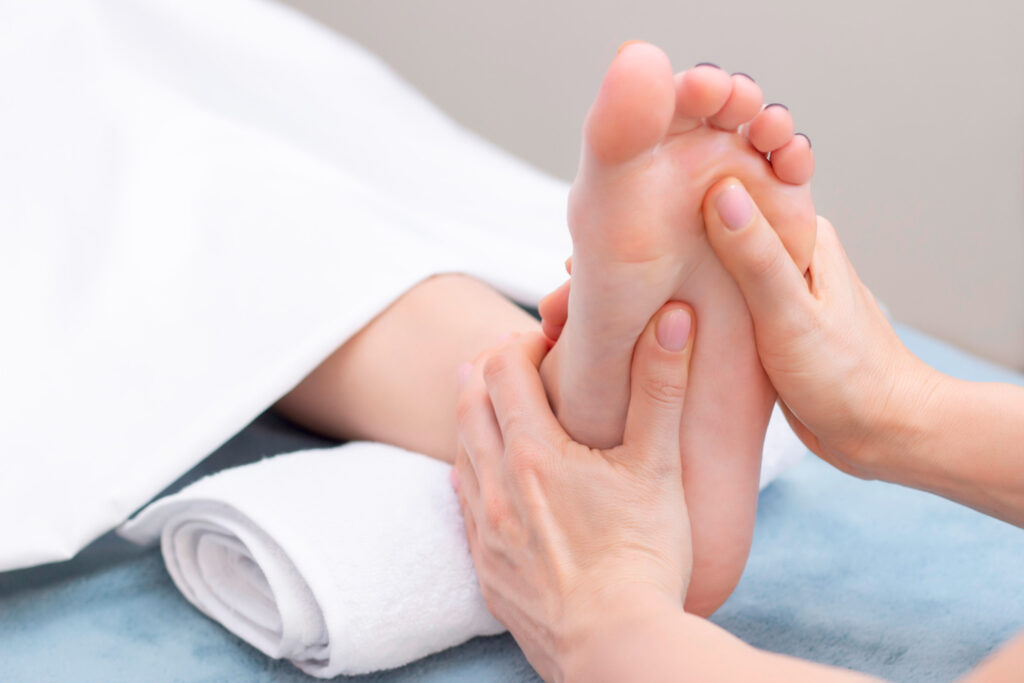 Reflexology session promoting relaxation and stress relief through targeted pressure points